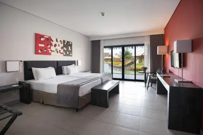 Uma cama ou camas num quarto em Vila Galé Resort Cumbuco - All inclusive