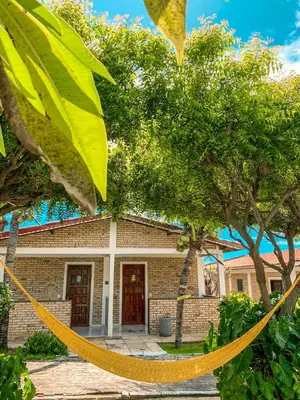 Um jardim no exterior de Pousada La Goduria