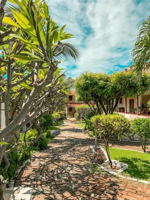 Um jardim no exterior de Pousada La Goduria