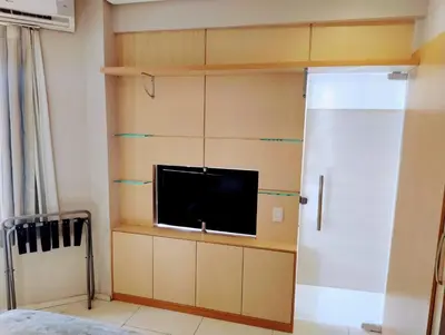 Uma televisão e/ou sistema de entretenimento em Nobile Suítes Golden Fortaleza