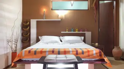 Uma cama ou camas num quarto em Araxá Pousada