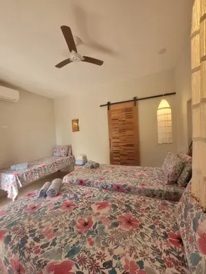Uma cama ou camas num quarto em Bangalo Das Dunas