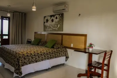 Uma cama ou camas num quarto em Pousada do Paiva