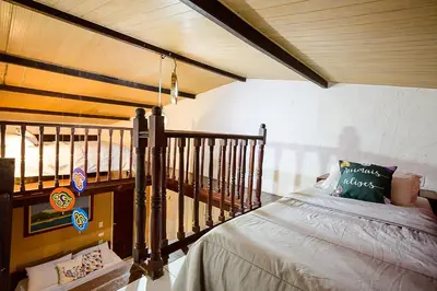 Uma cama ou camas num quarto em Olho D'Água Pousada