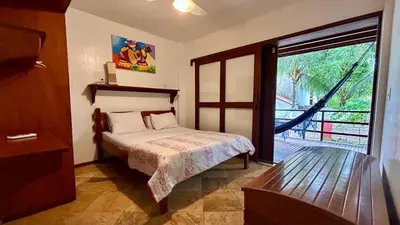 Uma cama ou camas num quarto em Casas MyM BOUGANVILLE 1 e 2