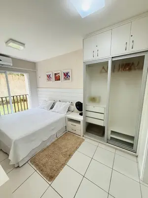 Uma cama ou camas num quarto em Beach Living