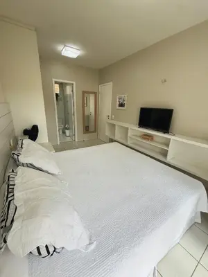 Uma cama ou camas num quarto em Beach Living