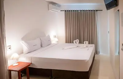 Uma cama ou camas num quarto em Azul Pousada