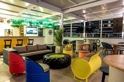 Uma área de estar em Hotel Villa Smart