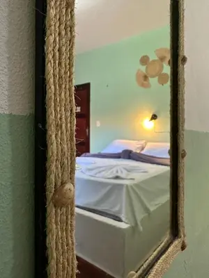 Uma cama ou camas num quarto em Pousada Casa do Josef