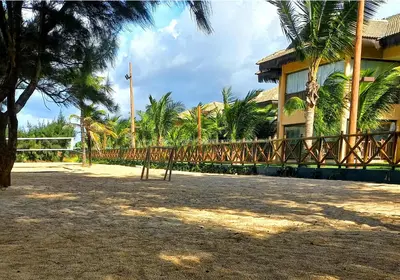 Um jardim no exterior de VG Sun Cumbuco