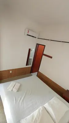 Uma cama ou camas num quarto em Albergaria Hostel