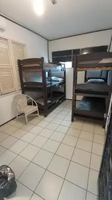 Uma cama ou camas num quarto em Albergaria Hostel