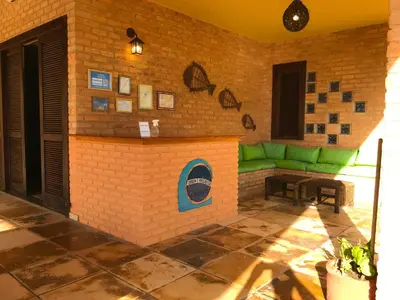 Uma área de estar em Hotel Pousada Beleza das Ondas
