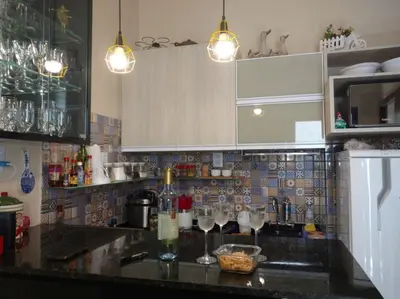 A cozinha ou kitchenette de LINDO CHALÉ NO CENTRO DE GUARAMIRANGA