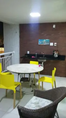 Uma área de estar em Apartamento em Golf Ville Resort