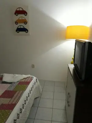 Uma cama ou camas num quarto em Casa 2 Quartos Mobiliada Cambeba - Com Garagem