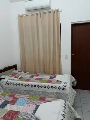 Uma cama ou camas num quarto em Casa 2 Quartos Mobiliada Cambeba - Com Garagem