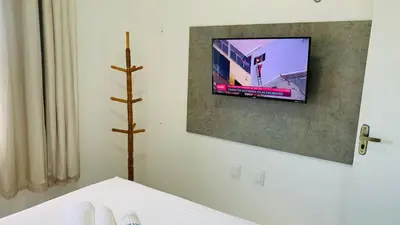 Uma televisão e/ou sistema de entretenimento em Fortal Flat