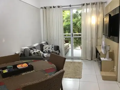 Uma televisão e/ou sistema de entretenimento em Condomínio Palm Beach