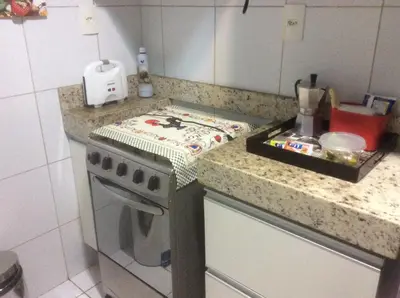 A cozinha ou kitchenette de Condomínio Palm Beach