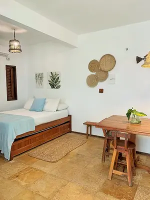 Uma cama ou camas num quarto em Manay Flats