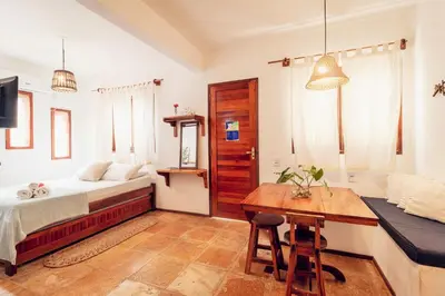 Uma cama ou camas num quarto em Manay Flats