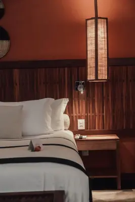 Uma cama ou camas num quarto em Vila Selvagem Hotel Contemporaneo