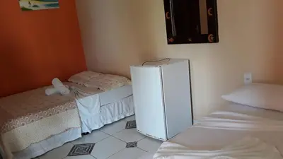 Uma cama ou camas num quarto em Pousada Via Lactea