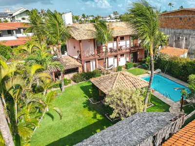 Um jardim no exterior de Pousada Meeting Point & KiteSchool