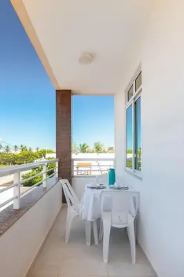 Uma varanda ou terraço em SAN GIACOMO I Apartamentos por Temporada para amigos, famílias e empresas no Porto das Dunas - Ceará