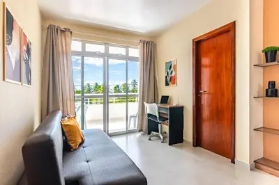 Uma área de estar em SAN GIACOMO I Apartamentos por Temporada para amigos, famílias e empresas no Porto das Dunas - Ceará