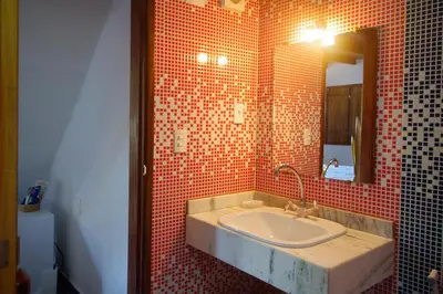 Uma casa de banho em Pousada Presidente Hotel