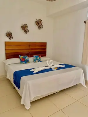 Uma cama ou camas num quarto em Pousada Matusa