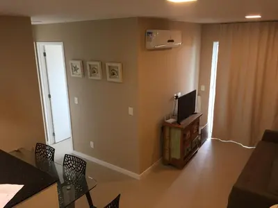 Uma televisão e/ou sistema de entretenimento em Apart Porto das Dunas