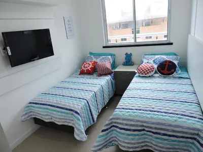 Uma cama ou camas num quarto em Apartamento com vista pro mar - Beach Way