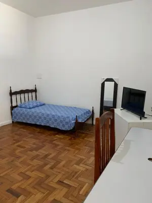 Uma cama ou camas num quarto em Casa Max