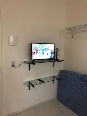 Uma televisão e/ou sistema de entretenimento em Casa Max
