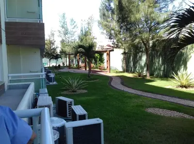 Um jardim no exterior de Vg Fun Residence
