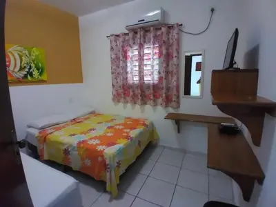 Uma cama ou camas num quarto em Chalés do Otto e Karine