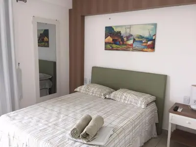 Uma cama ou camas num quarto em Apartamento no Condomínio Mediterranee