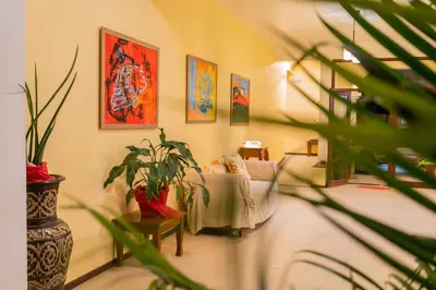 Uma cama ou camas num quarto em Hotel Villa Beija Flor