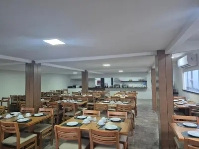Um restaurante ou outro lugar para comer em Pousada Arco Iris Fortaleza