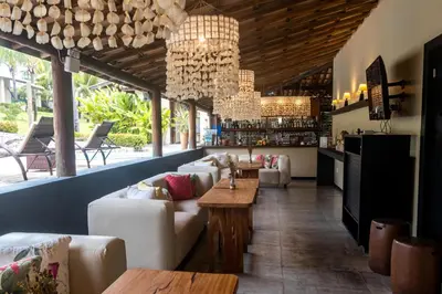 Uma área de estar em Hotel Villaggio Tudo Bom