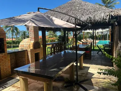 Um jardim no exterior de A Villa 8 suites 30 pessoas