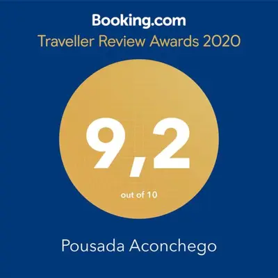 Um certificado, prémio, placa ou documento mostrado em Pousada Aconchego