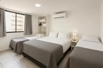 Uma cama ou camas num quarto em Atlantic Ocean Residence