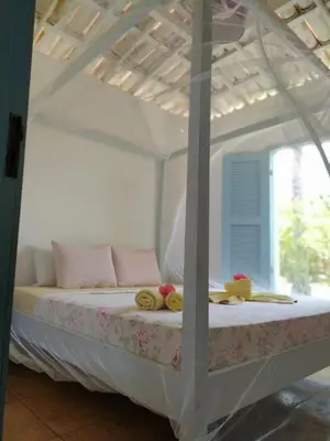 Uma cama ou camas num quarto em Refugios Parajuru - Casa Manga