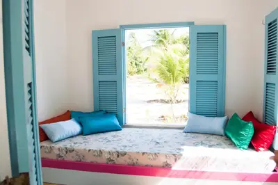 Uma cama ou camas num quarto em Refugios Parajuru - Casa Manga