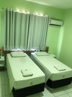 Uma cama ou camas num quarto em Hotel Letiva Arco